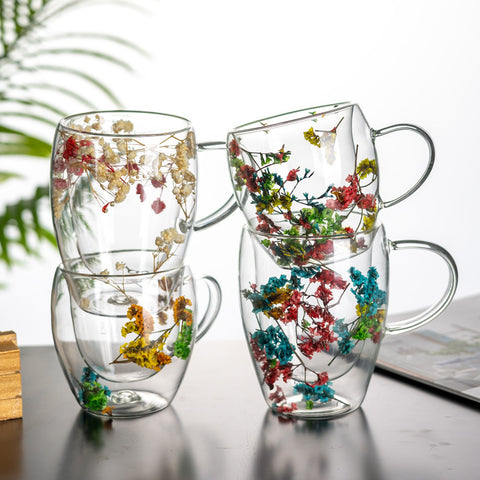 "Double-wall insulated glass coffee mug – heat-resistant, high-temperature safe, stylish dried flower design, elegant handle cup perfect for lattes, home, or office use."
